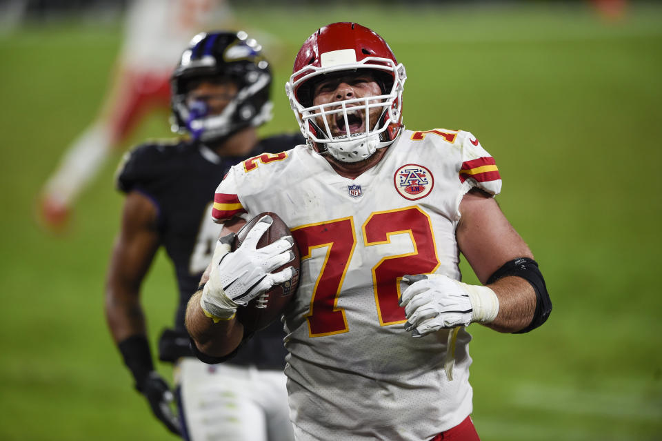 Kansas City Chiefs offensive tackle Eric Fisher (72) celebrates his touchdown catch during the second half of an NFL football game against the Baltimore Ravens, Monday, Sept. 28, 2020, in Baltimore. (AP Photo/Gail Burton)