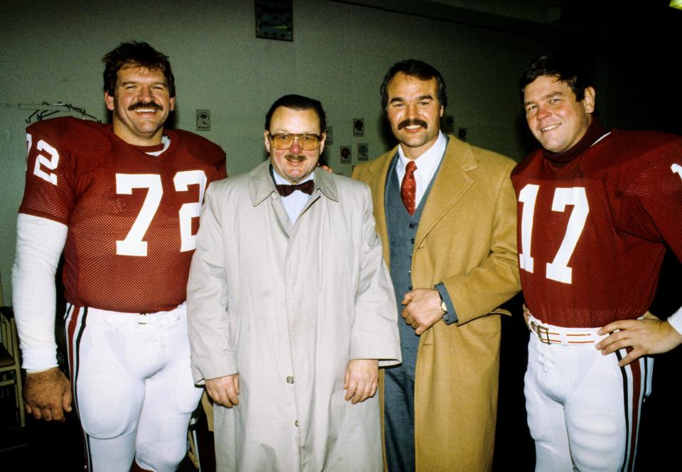 (Left to right) St. Louis Cardinals tackle Dan Dierdorf (72), owner Bill Bidwill, former guard Conrad Dobler and quarterback Jim Hart (17) stand together for a picture before the game against the Philadelphia Eagles at Busch Stadium. This was Dierdorf and Hart's last game with the Cardinals.