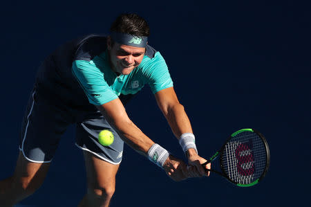 Tennis - Australian Open - Quarter-final - Melbourne Park, Melbourne, Australia, January 23, 2019. Canada's Milos Raonic in action during the match against France's Lucas Pouille. REUTERS/Lucy Nicholson