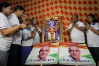 People pray before the issue of a verdict in the case of Indian national Kulbhushan Jadhav by International Court of Justice, in Mumbai