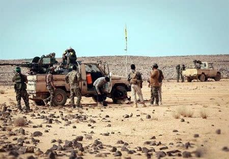 Nujaba fighters gather during an operation in southeast Syria near the border with Iraq and Jordan, in this handout picture released by Tasnim News Agency on July 17, 2017. Tasnim News Agency/Handout via REUTERS