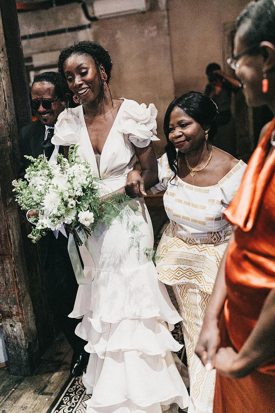 I walked down the aisle to Duke Ellington’s “In a Sentimental Mood” with both my mum and dad.