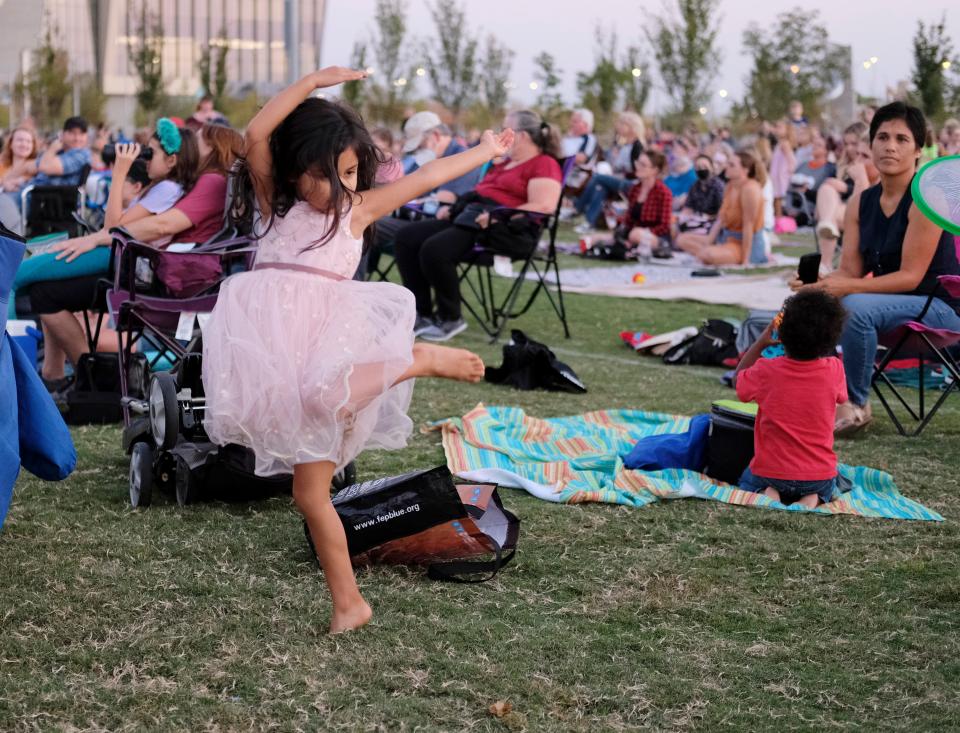 Children dance along at Oklahoma City Ballet's "Ballet Under the Stars" at Scissortail Park Friday, October 9, 2020.
