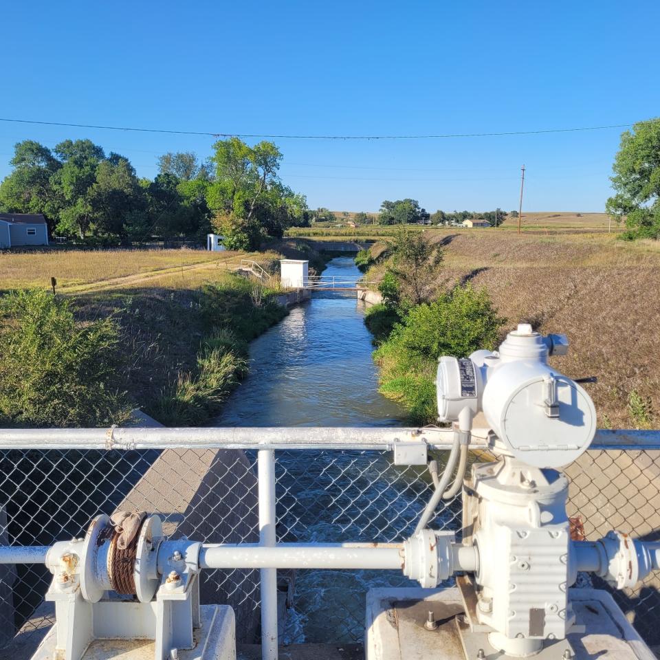 Cambridge Canal in south-central Nebraska, is pictured Monday, Aug. 22, 2022. It's a mystery why someone released 16 million gallons of water out of the canal one night earlier this month. (Bradley Edgerton via AP)