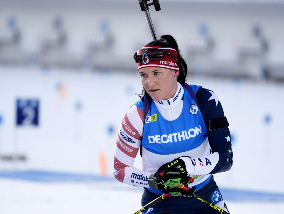 FILE - Joanne Reid, of The United States, competes during the women 7.5 km sprint competition at the Biathlon World Cup event in Pokljuka, Slovenia, Jan. 5, 2023. The United States Biathlon national champion was sexually harassed and abused for years by a ski-wax technician while racing on the sport's elite World Cup circuit, investigators found. When the two-time Olympian complained, Reid said she was told his behavior was just part of the male European culture. (AP Photo/Darko Bandic, File)