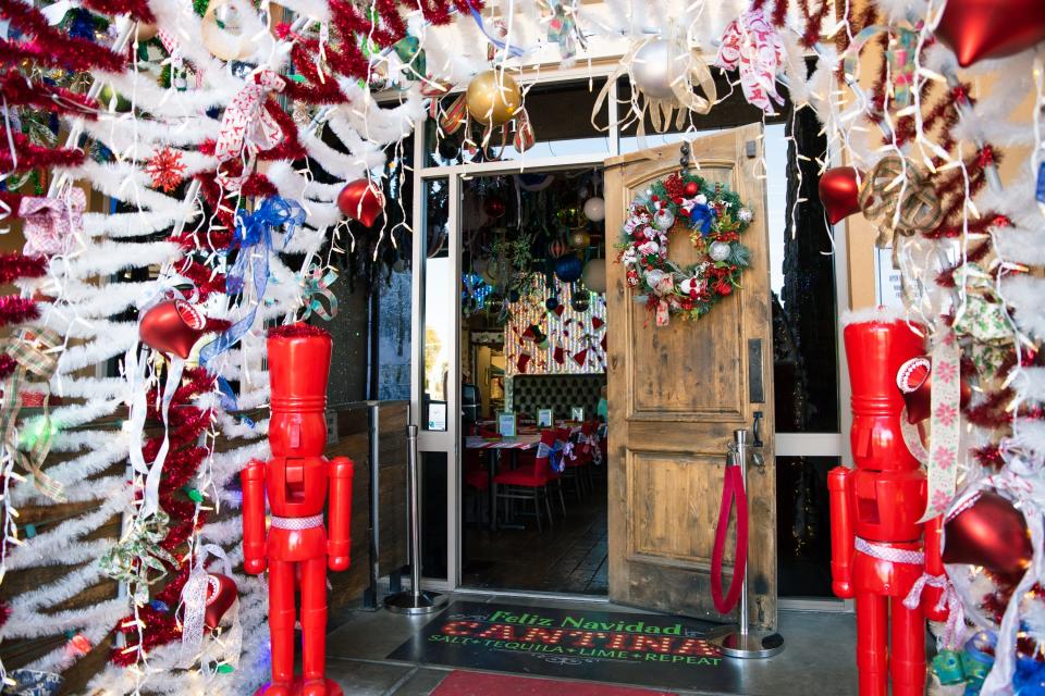 Entrance into the Salt and Lime Modern Mexican Grill after decorations transform it into the Feliz Navidad Cantina for the holidays on Nov. 29, 2021, in Scottsdale.