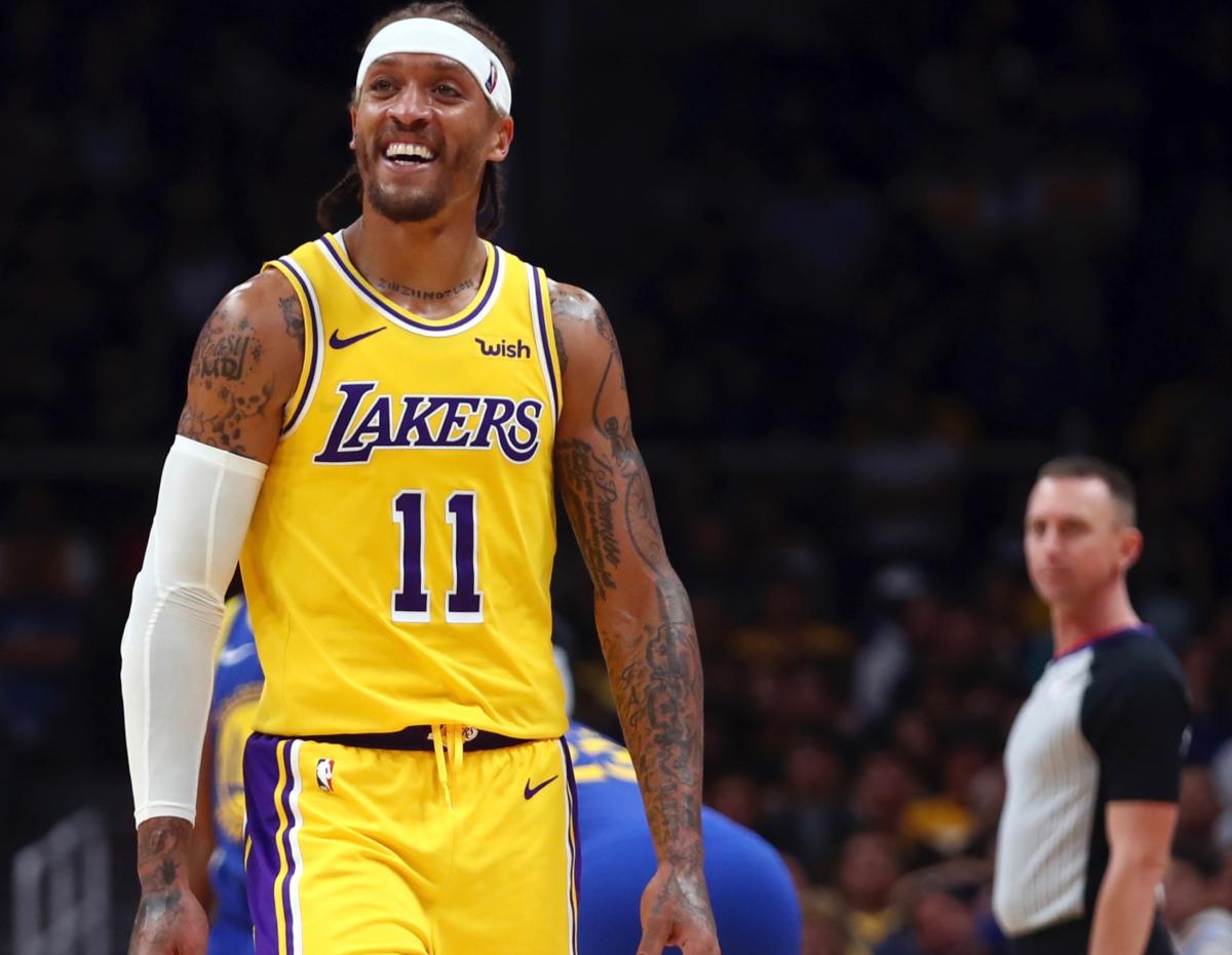 Michael Beasley checks into Lakers game wearing practice shorts, promptly  sent to locker room