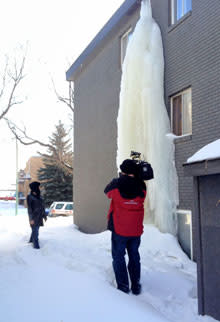 A neighbour is worried this giant icicle will fall down and crash into her basement apartment. 