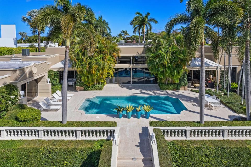 Facing the Intracoastal Waterway, a house that was listed at $55 million just changed hands at 940 N. Lake Way for a recorded $50 million.