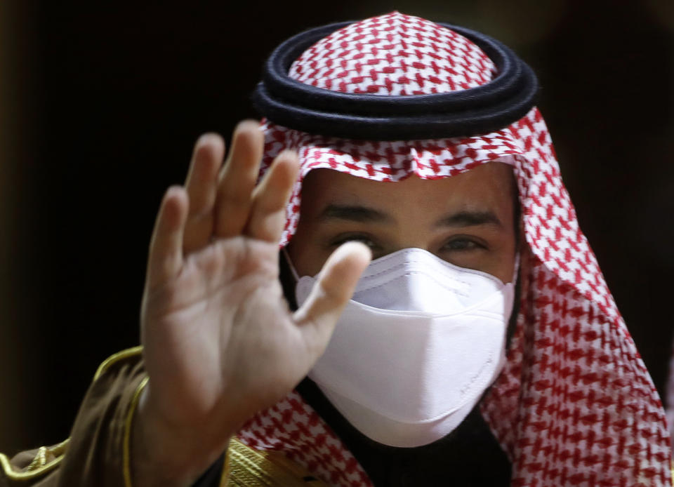 Saudi Crown Prince Mohammed bin Salman arrives to attend the Saudi Cup award ceremony during the final race of the $20 million, the Saudi Cup, at King Abdul Aziz race track in Riyadh, Saudi Arabia, Saturday, Feb. 20, 2021. (AP Photo/Amr Nabil)