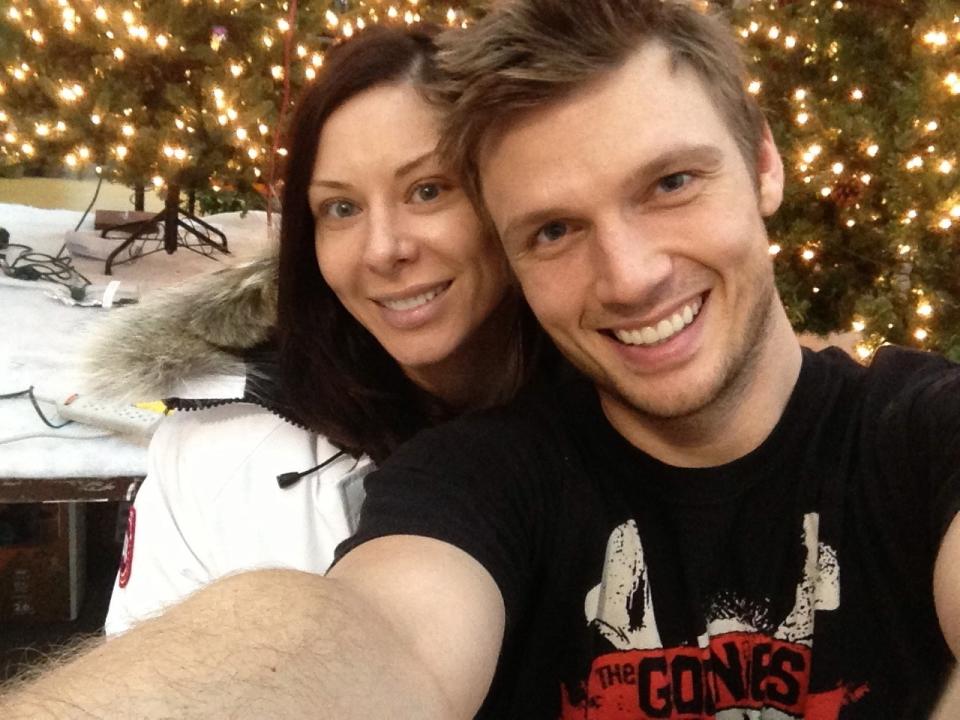 This undated image released by Nick Carter shows the Backstreet Boys member with his fitness trainer fiance Lauren Kitt. The Backstreet Boys singer proposed to Kitt in February, and he says they may bring their marriage to the small screen. “There have been offers and opportunities to film the actually wedding, like a TV show,” the 33-year-old said in a recent interview. The couple appears together in a series of fitness webisodes called “Kit Fitt.” (AP Photo/Nick Carter)