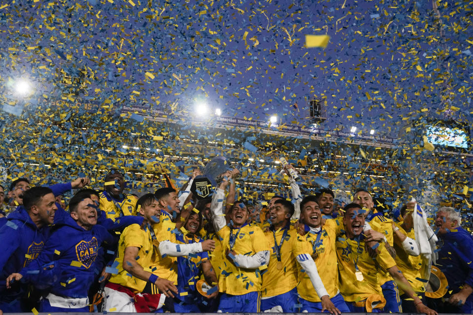 Boca Juniors players celebrates becoming the local soccer tournament champions after a match against Independiente in Buenos Aires, Argentina, Sunday, Oct. 23, 2022. (AP (AP Photo/Natacha Pisarenko)