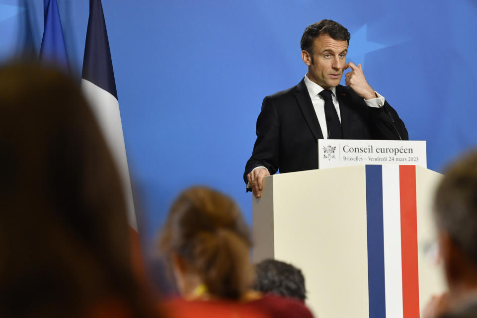 France's President Emmanuel Macron speaks during a media conference at an EU summit in Brussels, Friday, March 24, 2023. European leaders gathered Friday to discuss economic and financial challenges and banking rules, seeking to tamp down concerns about eventual risks for European consumers from banking troubles in the US and Switzerland. (AP Photo/Geert Vanden Wijngaert)