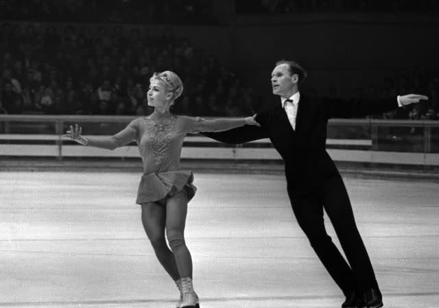 <p> STAFF/AFP via Getty</p> Oleg Protopopov and Ludmila Belousova compete as a pair at the 1968 Winter Olympics in Innsbruck, Austria.