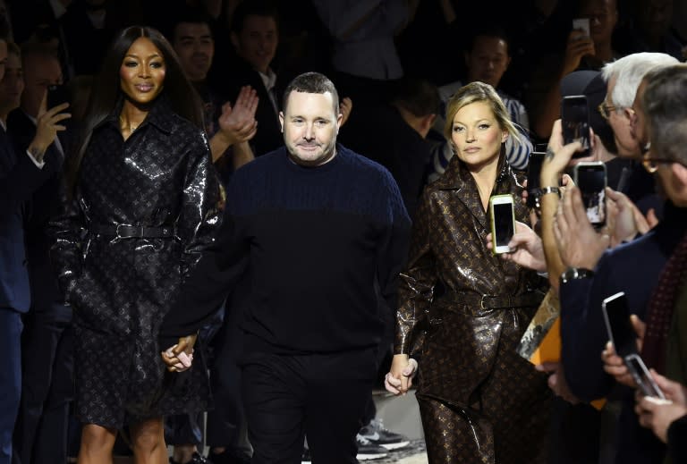 British designer Kim Jones with British models Naomi Campbell and Kate Moss at his Louis Vuitton show in January 2018