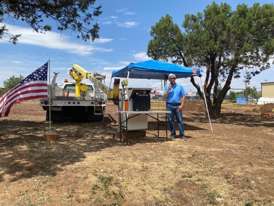 White Mountain Coalition Against Homelessness Vice President Roger Brown speaks about the creation of Victory Village in front of a crowd of community members gathered to celebrate the start of construction on July 28, 2023, in Show Low.