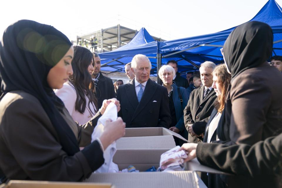 The King meets members of the Turkish community, who have been collecting, packaging, and organising the transportation of food, blankets, and warm clothing for those affected by a February earthquake (Kirsty O’Connor / PA)