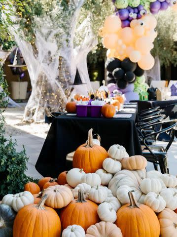 <p>Khloe Kardashian/Instagram</p> Pumpkin display at the foot of the decorating tables.