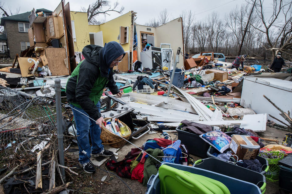 People sorting through belongings