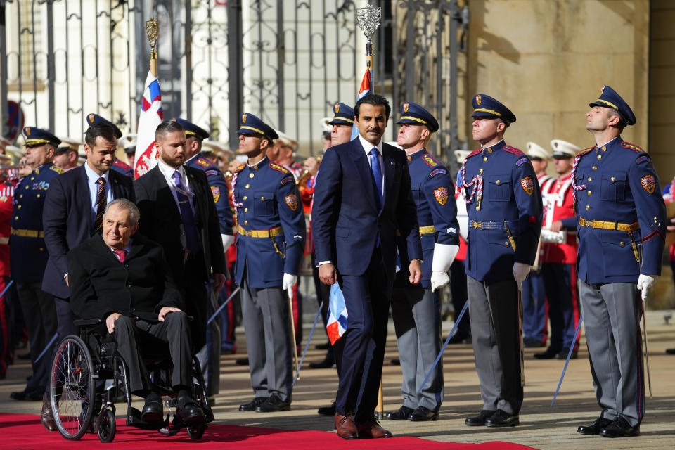 Czech Republic's President Millos Zeman, left, welcomes Qatari Emir Sheikh Tamim Bin Hamad Al-Thani at the Prague Castle in Prague, Czech Republic, Wednesday, Oct. 5, 2022. (AP Photo/Petr David Josek)