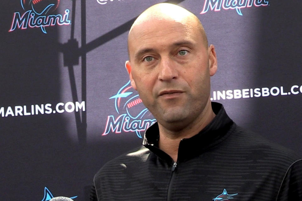 FILE - In this Feb. 24, 2020, file photo, Miami Marlins CEO Derek Jeter talks to the media before the team plays the St. Louis Cardinals in a baseball game in Jupiter, Fla. Jeter blames the team’s coronavirus outbreak on a collective false sense of security that made players lax about social distancing and wearing masks. Infected were 21 members of the team’s traveling party, including at least 18 players. (Charles Trainor Jr./Miami Herald via AP, File)