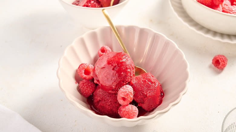 scoops of raspberry sorbet in bowl