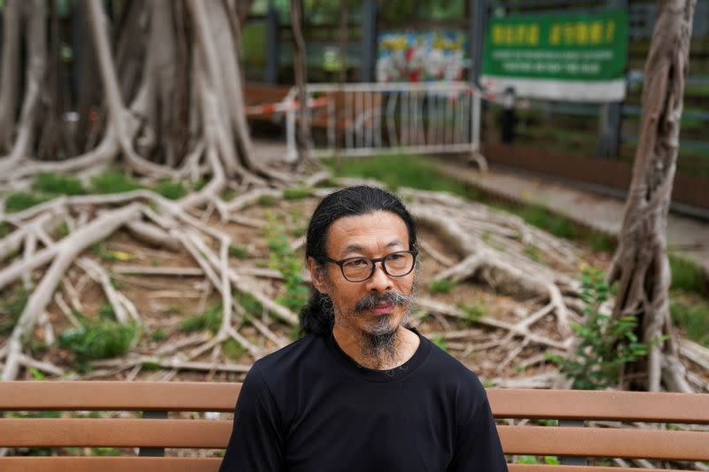 Labour rights activist Han Dongfang poses for a picture outside Victoria Park in Hong Kong