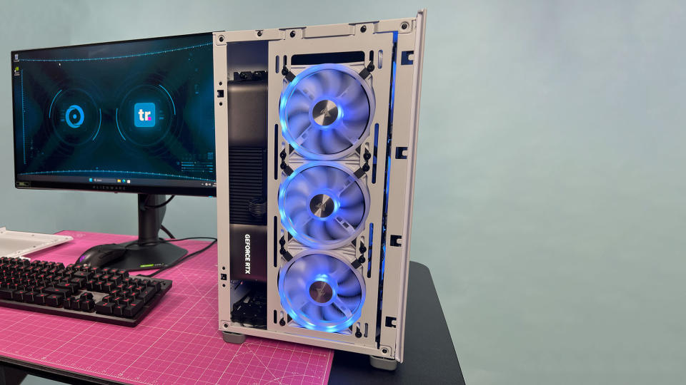 A Origin Chronos V3 gaming PC on a desk