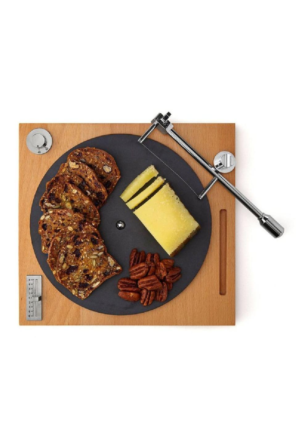 <p><a href="https://go.redirectingat.com?id=74968X1596630&url=https%3A%2F%2Fwww.uncommongoods.com%2Fproduct%2Fturntable-cheese-board&sref=https%3A%2F%2Fwww.cosmopolitan.com%2Fstyle-beauty%2Ffashion%2Fg33811899%2Fgifts-for-music-lovers%2F" rel="nofollow noopener" target="_blank" data-ylk="slk:Shop Now;elm:context_link;itc:0;sec:content-canvas" class="link ">Shop Now</a></p><p>Turntable Cheese Board</p><p>uncommongoods.com</p><p>$78.00</p>