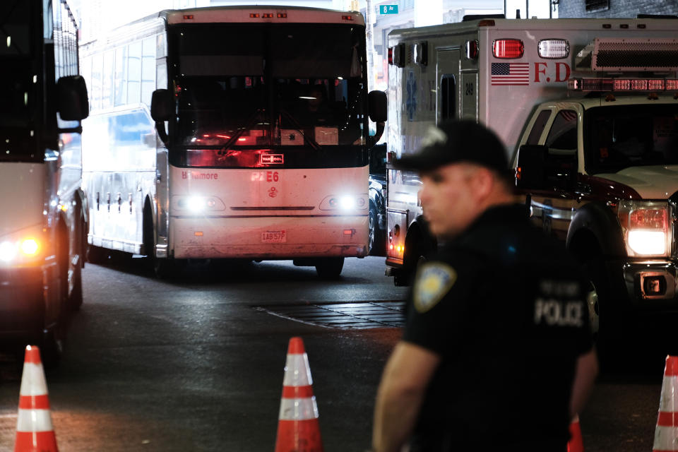 A bus carrying migrants arrives into the Port Authority bus station in New York City in Aug. 2022. (Spencer Platt / Getty Images file)