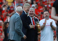 <p>Soccer Football – Premier League – Arsenal vs Burnley – Emirates Stadium, London, Britain – May 6, 2018 Arsenal manager Arsene Wenger with Pat Rice and Bob Wilson after the match REUTERS/Ian Walton EDITORIAL USE ONLY. No use with unauthorized audio, video, data, fixture lists, club/league logos or “live” services. Online in-match use limited to 75 images, no video emulation. No use in betting, games or single club/league/player publications. Please contact your account representative for further details. </p>