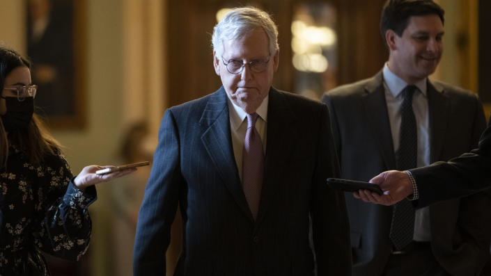 Senate Minority Leader Mitch McConnell speaks to reporters after addressing the Senate chamber. 