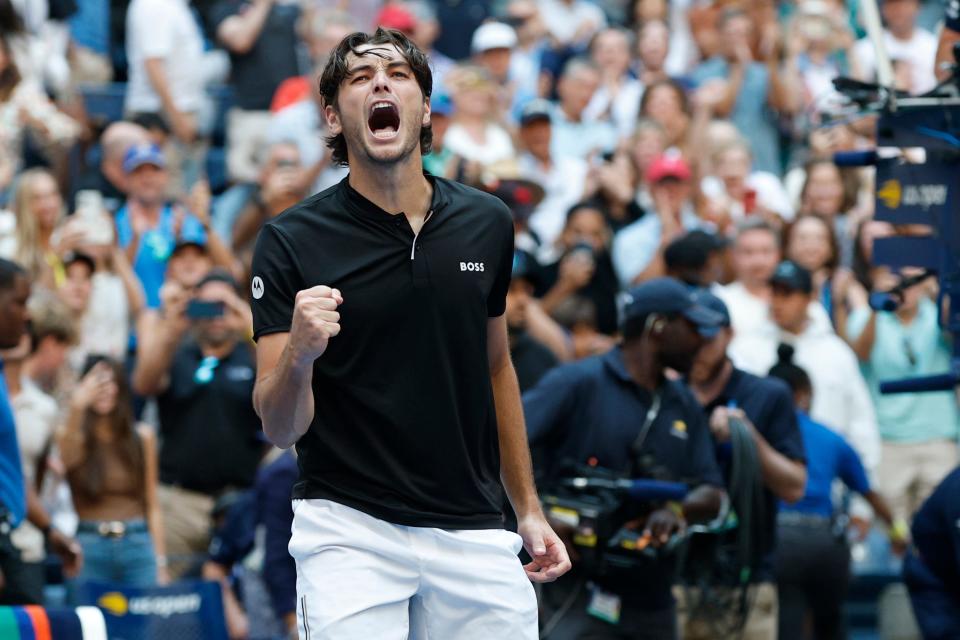 Taylor Fritz celebrates after his match against Alexander Zverev.