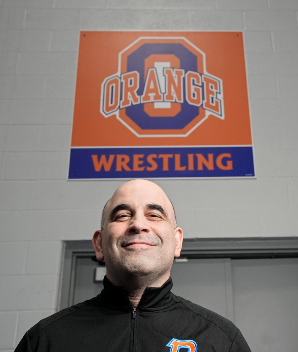 Olentangy Orange's Brian Nicola is The Dispatch's All-Metro Girls Wrestling Coach of the Year.