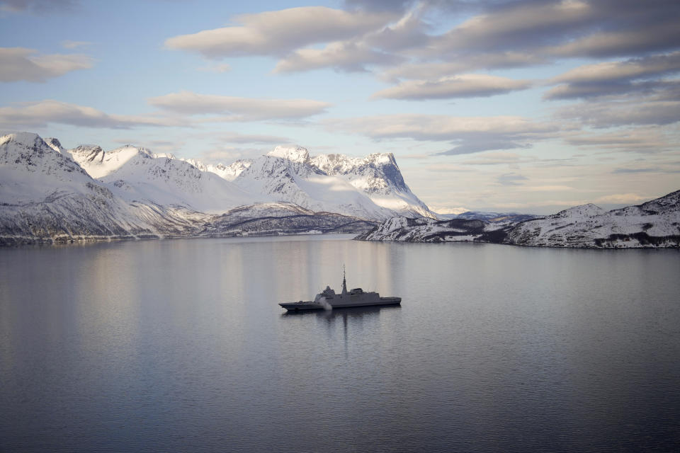 The French navy frigate Normandie patrols in a Norwegian fjord, north of the Arctic circle, Wednesday March 6, 2024. The French frigate is part of a NATO force conducting exercises in the seas, north of Norway, codenamed Steadfast Defender, which are the largest conducted by the 31 nation military alliance since the cold war. (AP Photo/Thibault Camus)