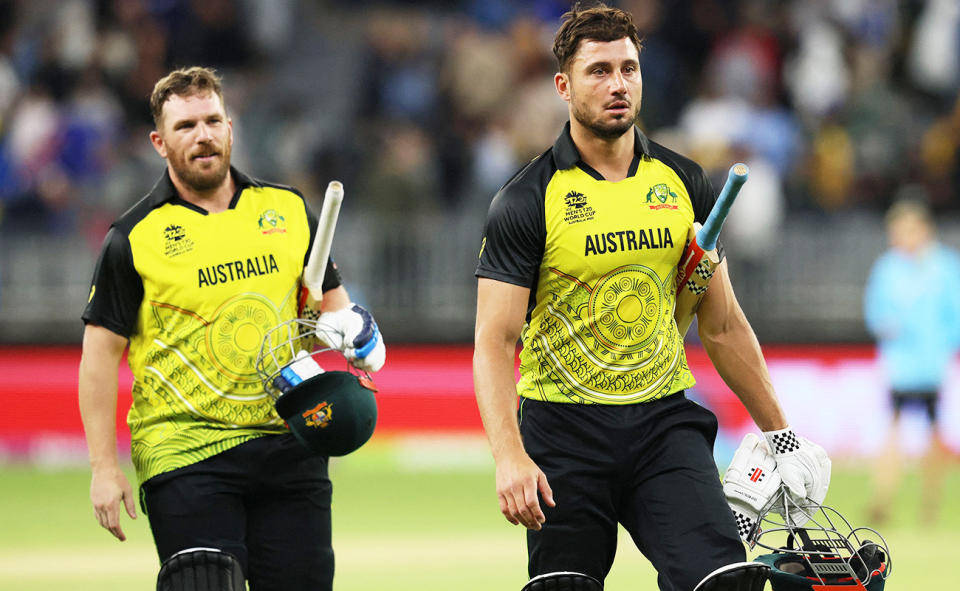 Aaron Finch and Marcus Stoinis, pictured here walking off the field after Australia's win over Sri Lanka at the T20 World Cup.