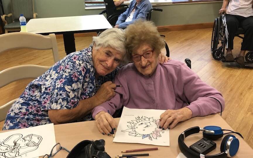Joanne Loewenstern, 79, hugs her birth mother, Lillian Ciminieri, 100.  - Photo: Elliot Loewenstern