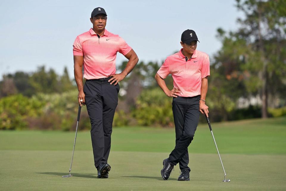 PHOTO: Tiger Woods and his son, Charlie Woods, stand together on the second green during a tournament, Dec. 17, 2022, in Orlando, Fla. (Ben Jared/PGA Tour via Getty Images, FILE)