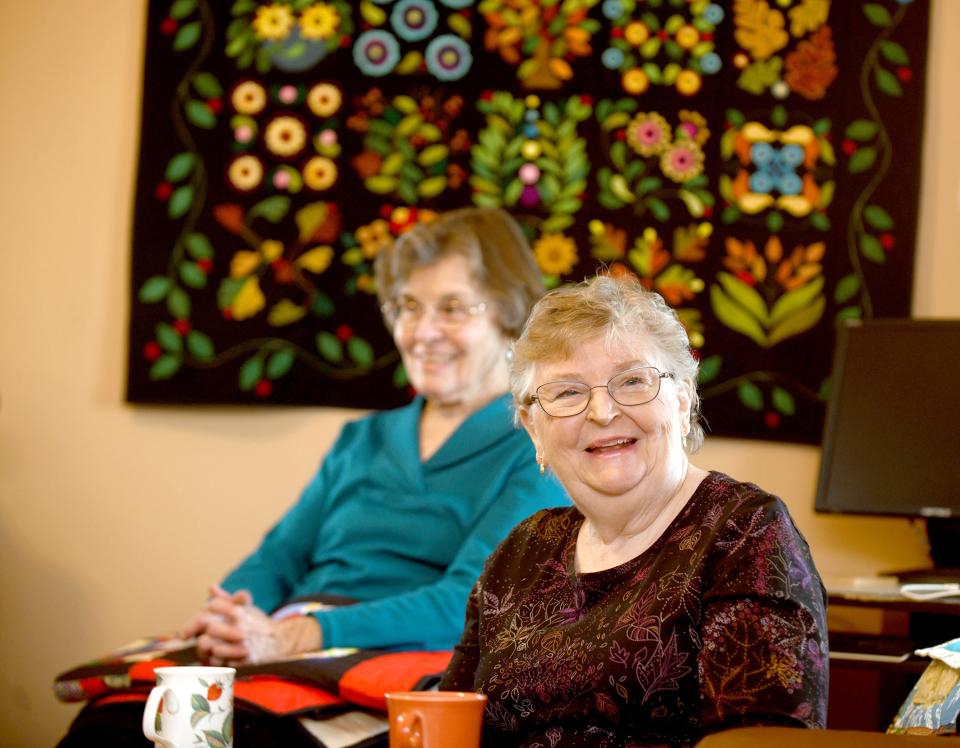 Judy Stump and Sherry Carpenter talk about their 
time in Canton Quilters Guild as they celebrates its 25th anniversary.  Thursday, April 28, 2022.