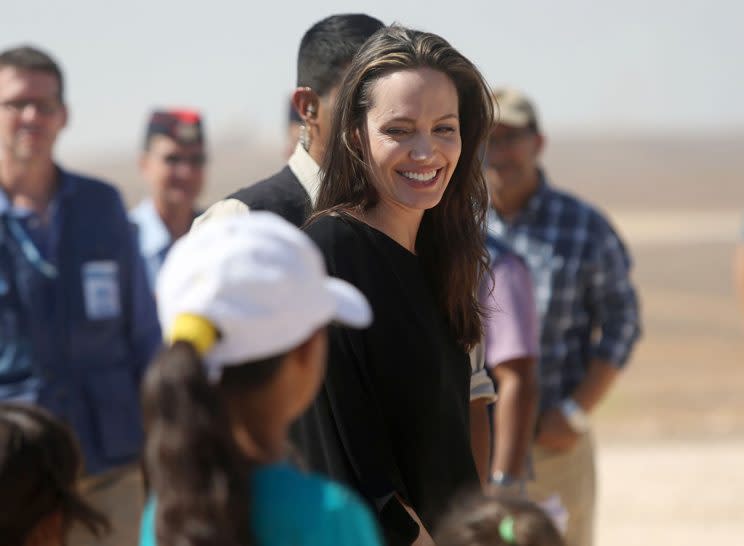 AZRAQ, JORDAN - SEPTEMBER 09: US actress and UNHCR special envoy and Goodwill Ambassador Angelina Jolie greets children during a press conference at Al- Azraq camp for Syrian refugees on September 9, 2016, in Azraq, Jordan. Jolie arrived at the camp and visited syrian families before speaking to the media. (Photo by Jordan Pix/Getty Images)