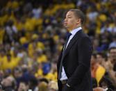 Jun 1, 2017; Oakland, CA, USA; Cleveland Cavaliers head coach Tyronn Lue reacts against the Golden State Warriors in the second half of the 2017 NBA Finals at Oracle Arena. Mandatory Credit: Kyle Terada-USA TODAY Sports