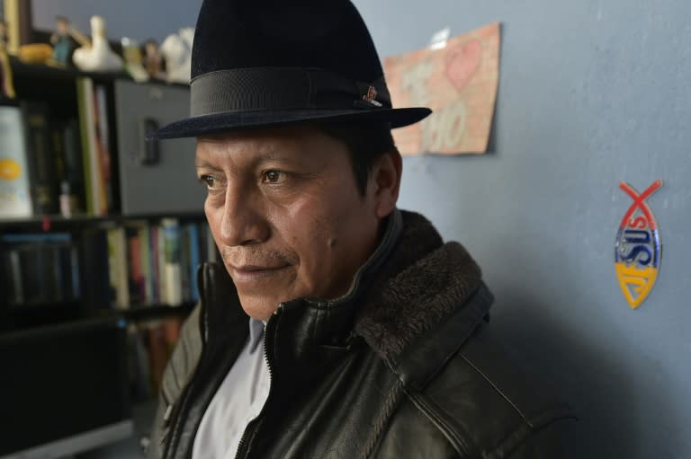 Quechua Indian Gustavo Negrete, evangelical pastor of the Llamahuasi community, speaks with AFP during an interview at his home in Pujili, Ecuador, on June 28, 2015