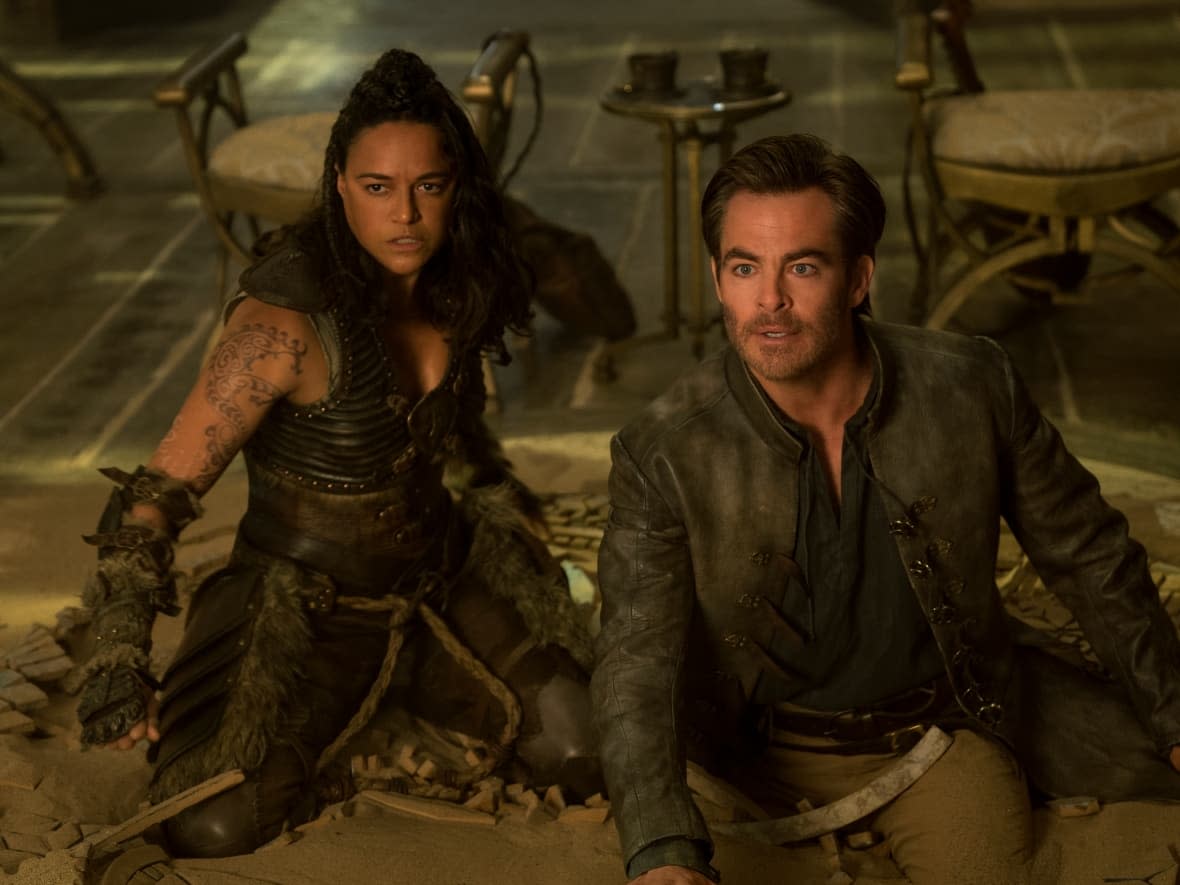 Chris Pine and Michelle Rodriguez play a thief and a barbarian who try to save themselves and win the day in Dungeons & Dragons: Honor Among Thieves. (Aidan Monaghan - image credit)