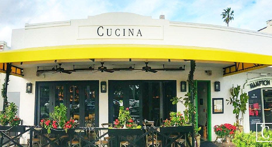 Cucina is deconstructing its patio space, dubbed Cucina Beach, after incurring a slew of code violations over the patio's unpermitted construction.