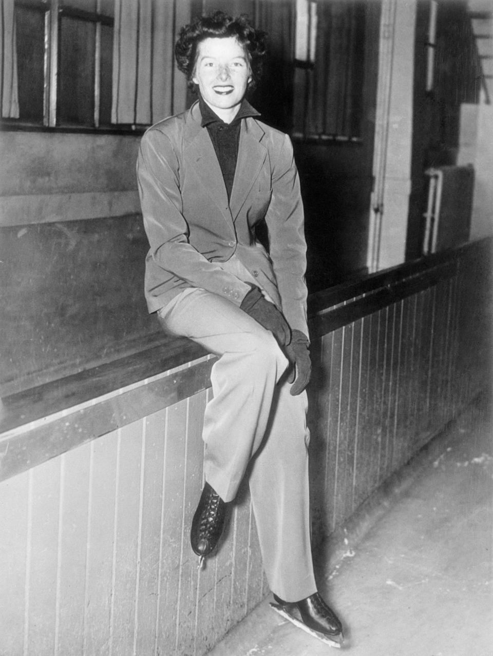 Hepburn wears a suit on the ice rink at Madison Square Garden in this photo from 1936.&nbsp;