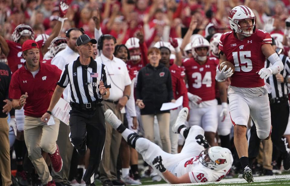 Wisconsin safety John Torchio scores a touchdown on a 100-yard interception return during the Badgers' season-opening game against Illinois State on Sept. 3.