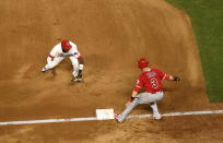 Texas Rangers shortstop Jurickson Profar runs to tag out Los Angeles Angels' Taylor Ward (3) for one out of a triple play on a ground ball by David Fletcher off of Texas Rangers starting pitcher Ariel Jurado during the fourth inning of a baseball game, Thursday, Aug. 16, 2018, in Arlington, Texas. Fletcher and Eric Young Jr. were also out on the play. (AP Photo/Jeffrey McWhorter)