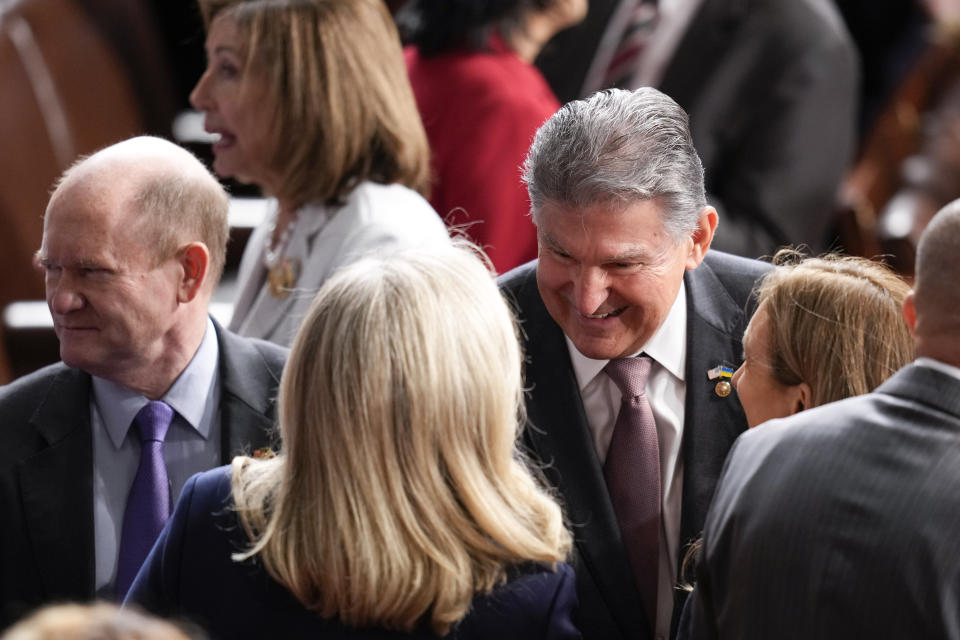 Sen. Joe Manchin, D-W.Va., arrives before South Korean President Yoon Suk Yeol addresses a joint meeting of Congress in the House chamber at the Capitol in Washington, Thursday, April 27, 2023. Nancy Pelosi, D-Calif., is at back left. (AP Photo/Alex Brandon)