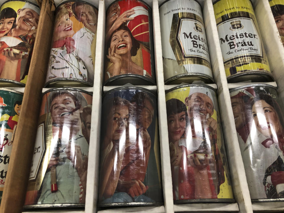 Vintage mid-century beer cans are on display Thursday, Aug. 29, 2019, in Albuquerque, N.M., at the 49th annual gathering of members of the Brewery Collectibles Club of America. Collectors from around the world began Thursday buying, trading and selling containers of brews at the annual four-day event billed the "CANvention." (AP Photo/Russell Contreras)