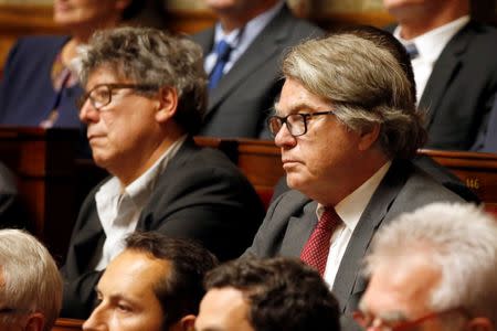 Newly-elected member of parliament Gilbert Collard (R) of France's far-right National Front (FN) political party attends the opening session of the French National Assembly in Paris, France, June 27, 2017. REUTERS/Charles Platiau